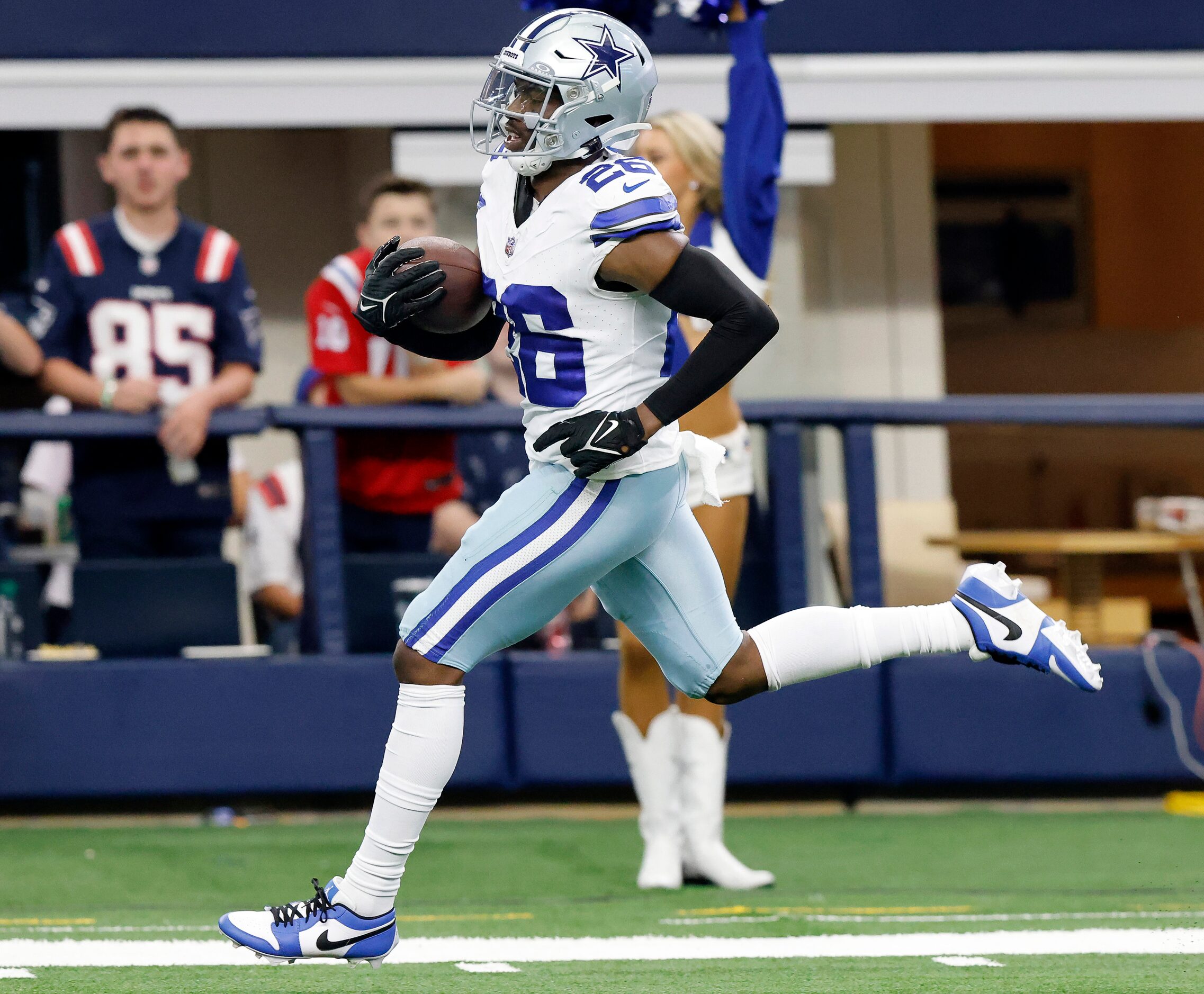 Dallas Cowboys cornerback DaRon Bland (26) intercepts a second quarter pass and returns it...