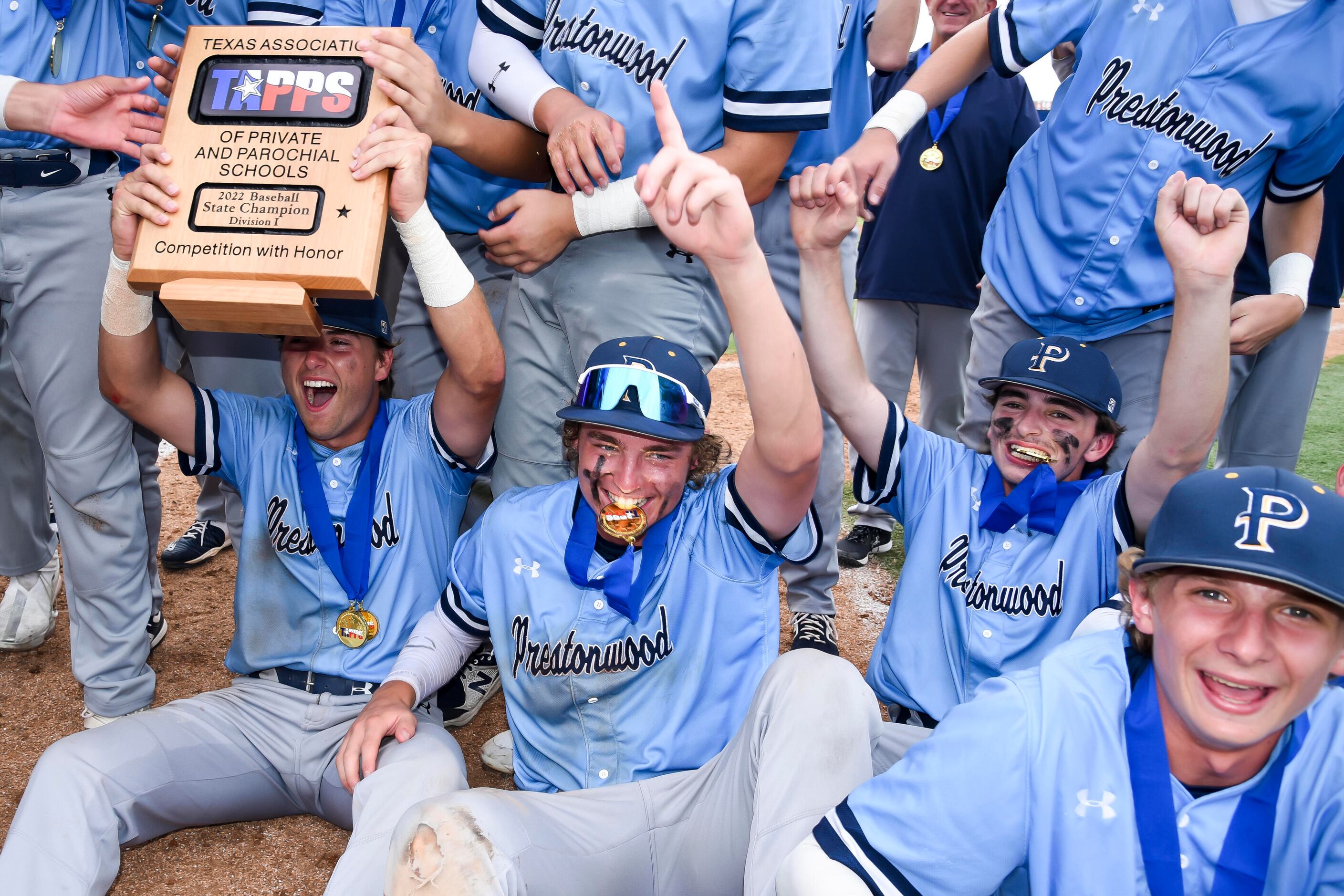 Prestonwood players celebrate after making the final out to win the TAPPS Division I...