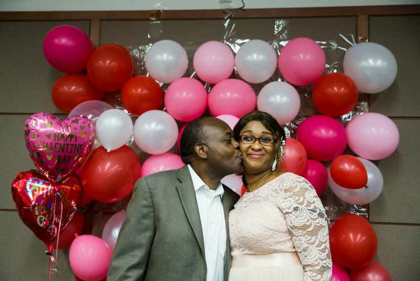 Bin Mazola kissed Titilope Oluyemi after they were married by Judge Martin Hoffman on Feb....