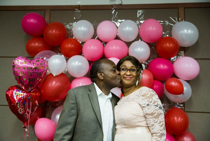 Bin Mazola kissed Titilope Oluyemi after they were married by Judge Martin Hoffman on Feb....