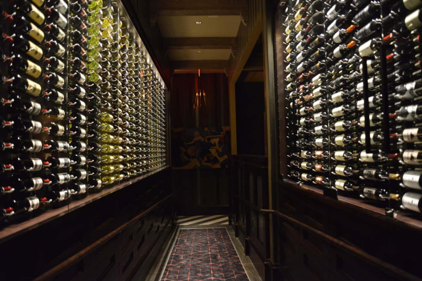 A hallway lined with wine at Ruth's Chris Steak House opening on Cedar Springs Road in...