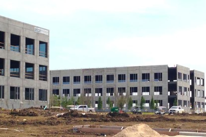 
Four office buildings are under construction in the Cypress Waters development in Irving,...