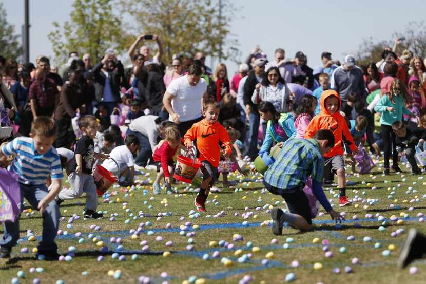 Kids collect eggs at an Easter egg hunt in this file photo. The Urban Market will be hosting...