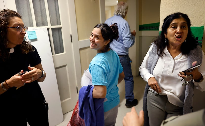 After her family arranged an Uber ride, a Colombian migrant who goes by Norma (center) says...