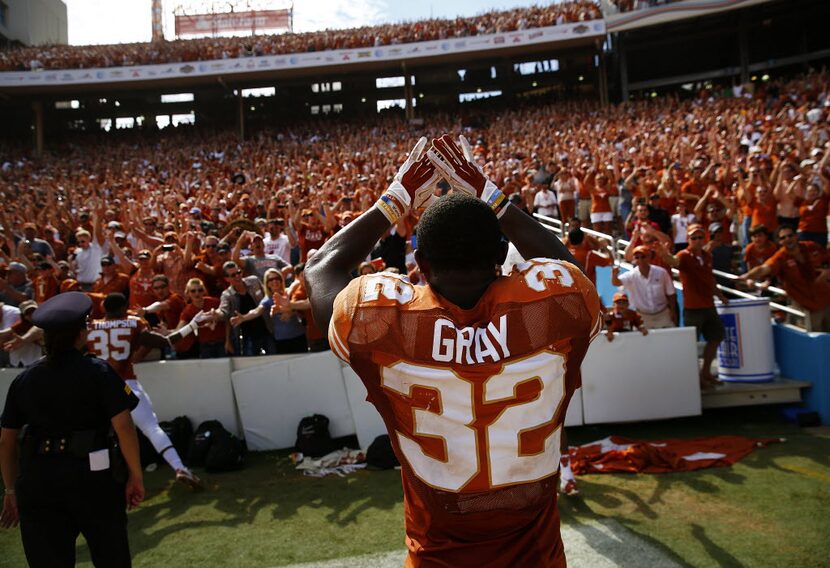 Texas Longhorns running back Johnathan Gray (32) celebrates with fans after beating the...