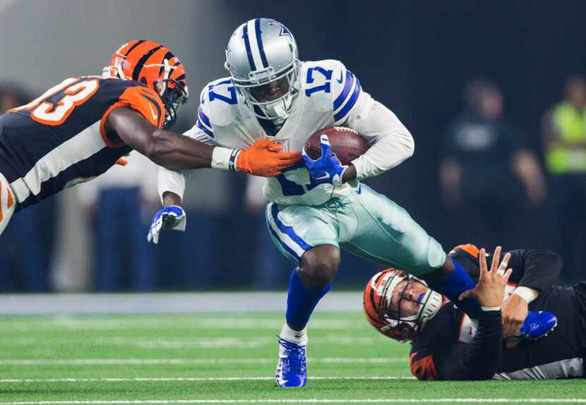 Dallas Cowboys wide receiver Allen Hurns (17) is tackled by Cincinnati Bengals defensive...