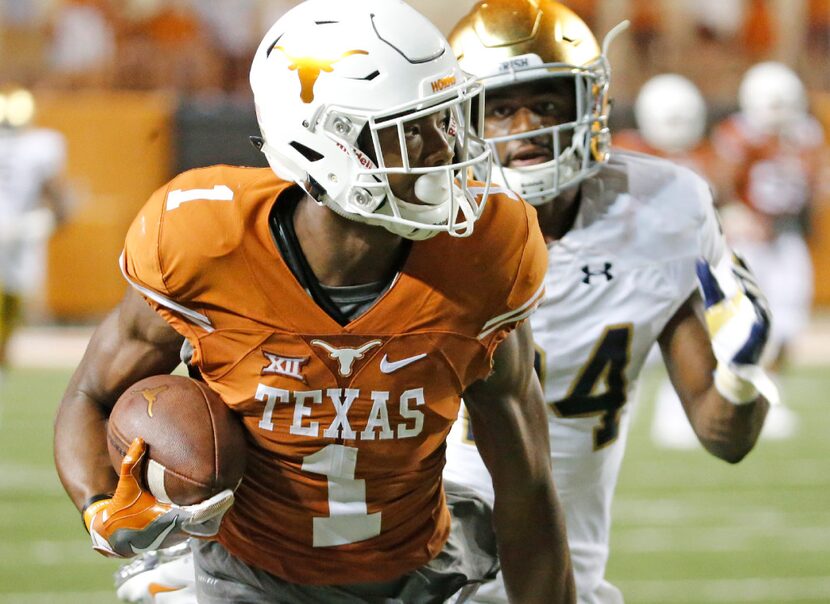 FILE - Texas wide receiver John Burt (1) is pictured during the Notre Dame Fighting Irish...