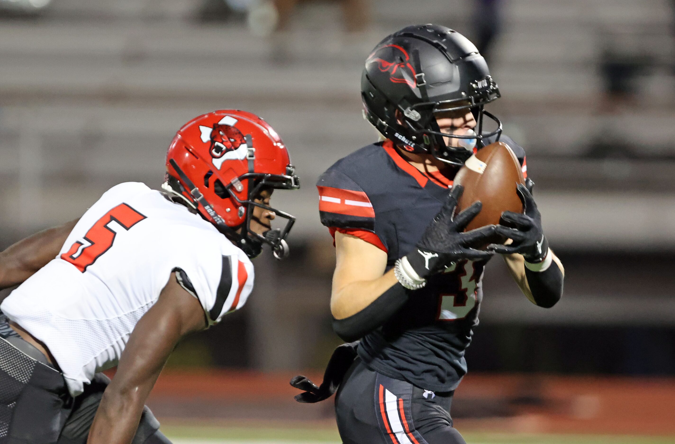 Rockwall Heath’s Peyton Wingfield (3) grabs a touchdown pass over Mesquite Horn defender...