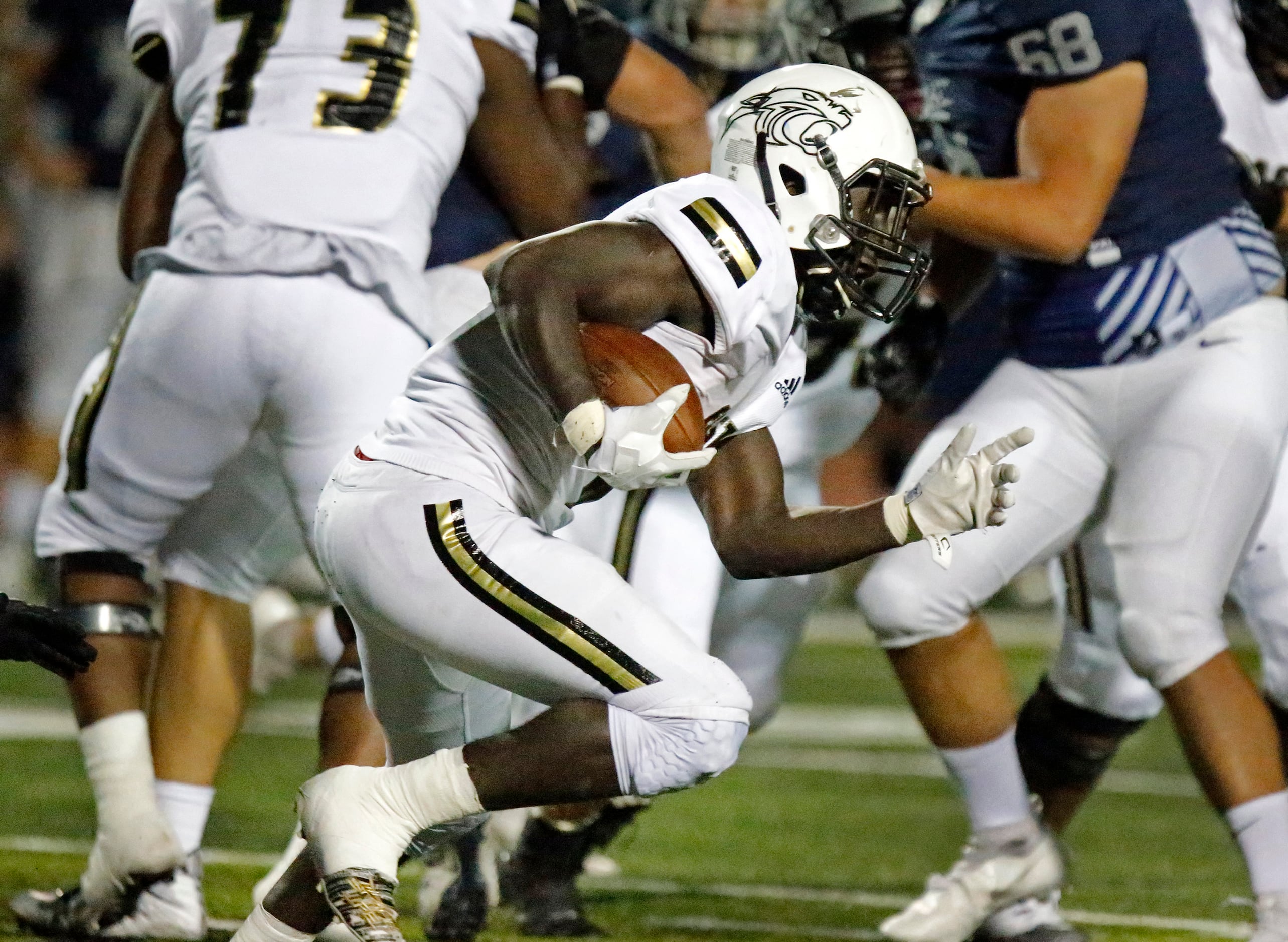 Plano East High School running back Ismail Mahdi (6) during the first half as Flower Mound...