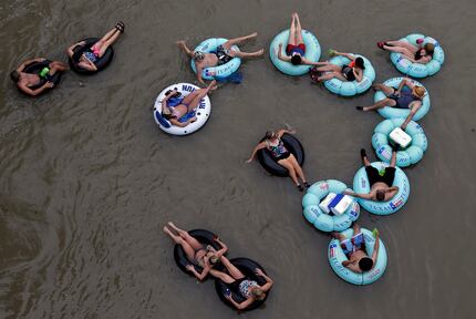 Tubers float the Comal River in New Braunfels.  (AP File Photo/Eric Gay)