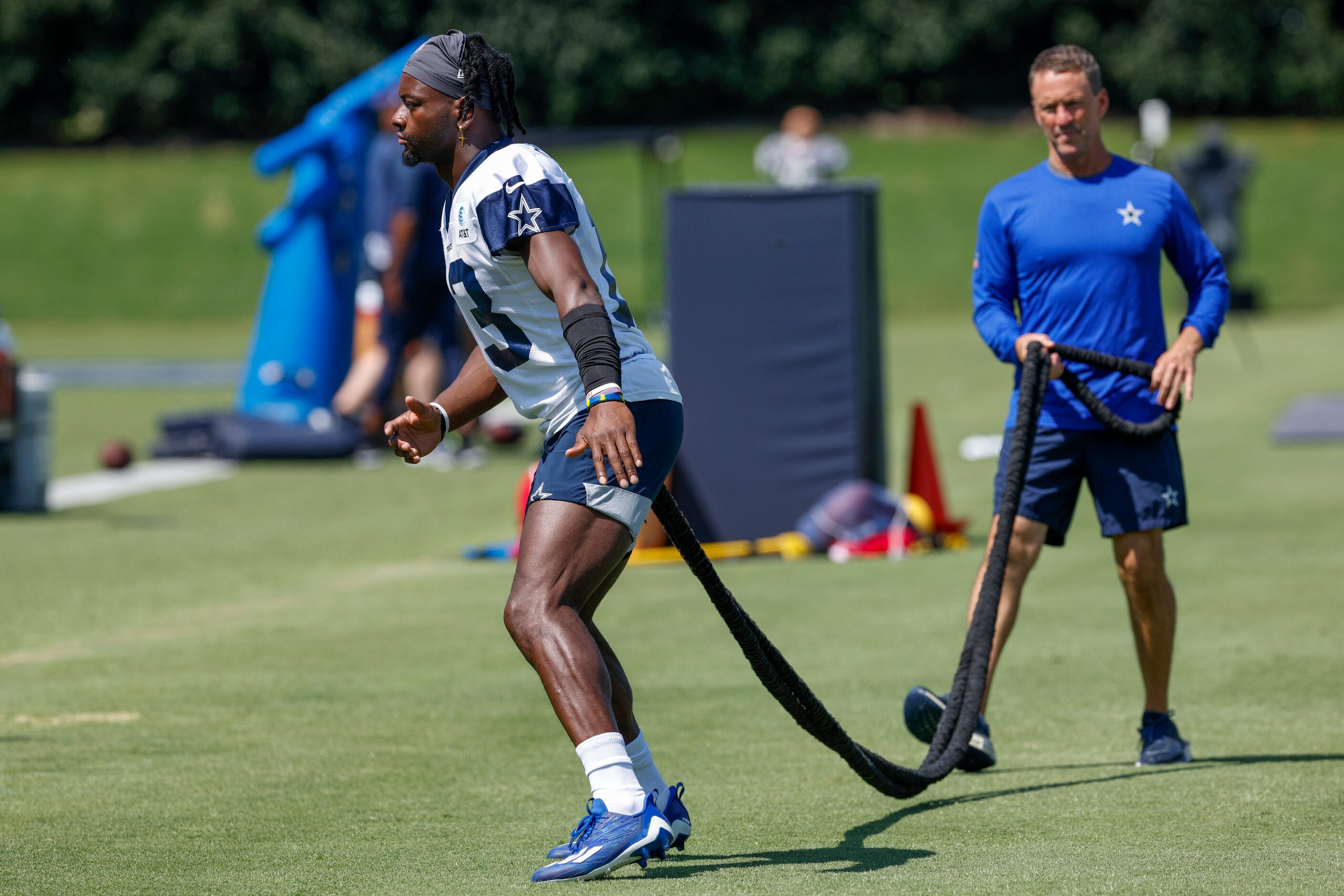 Dallas Cowboys wide receiver Michael Gallup (13) works with a trainer during a practice at...