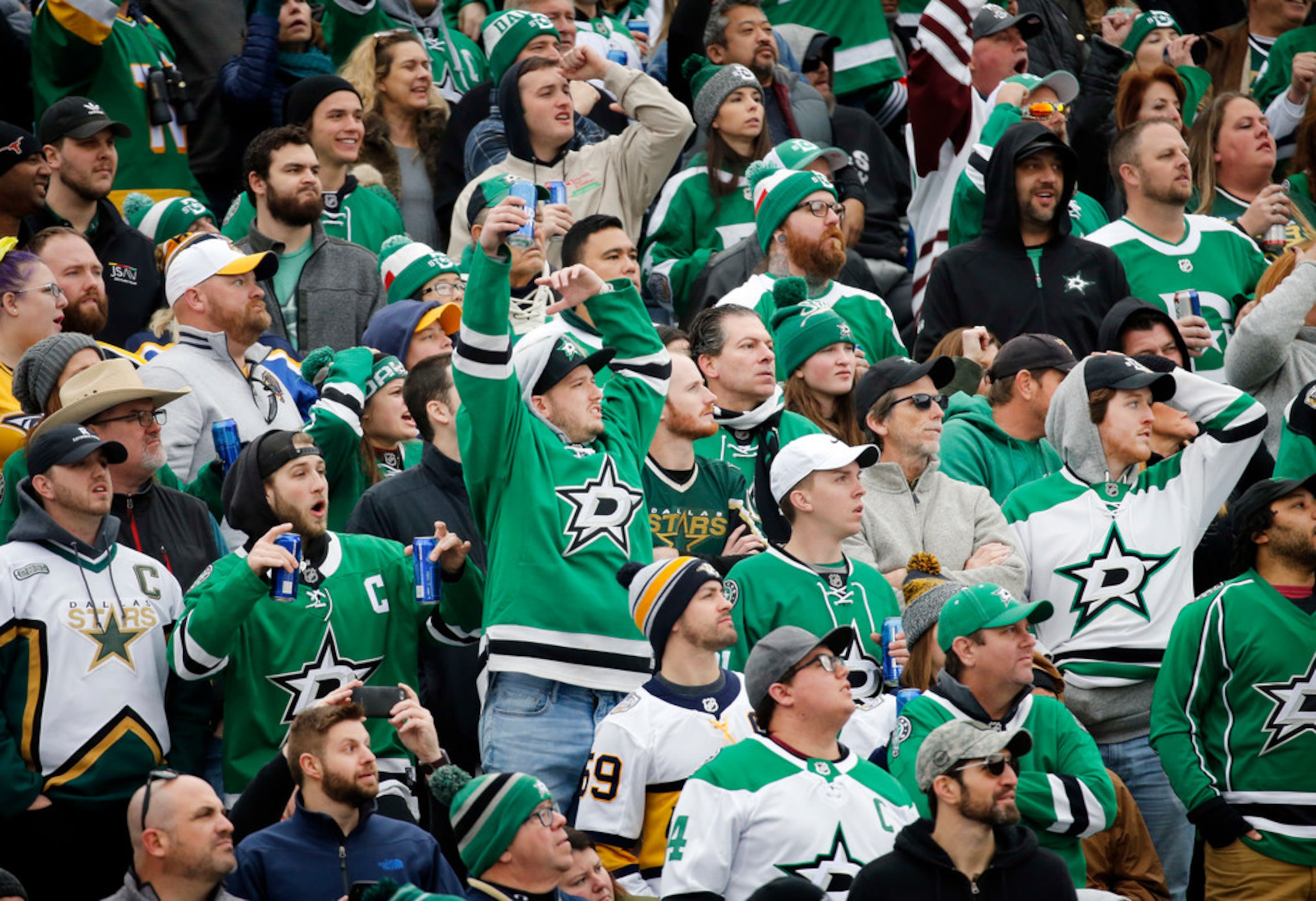 Dallas Stars fans get excited as they look to score against the Nashville Predators in the...