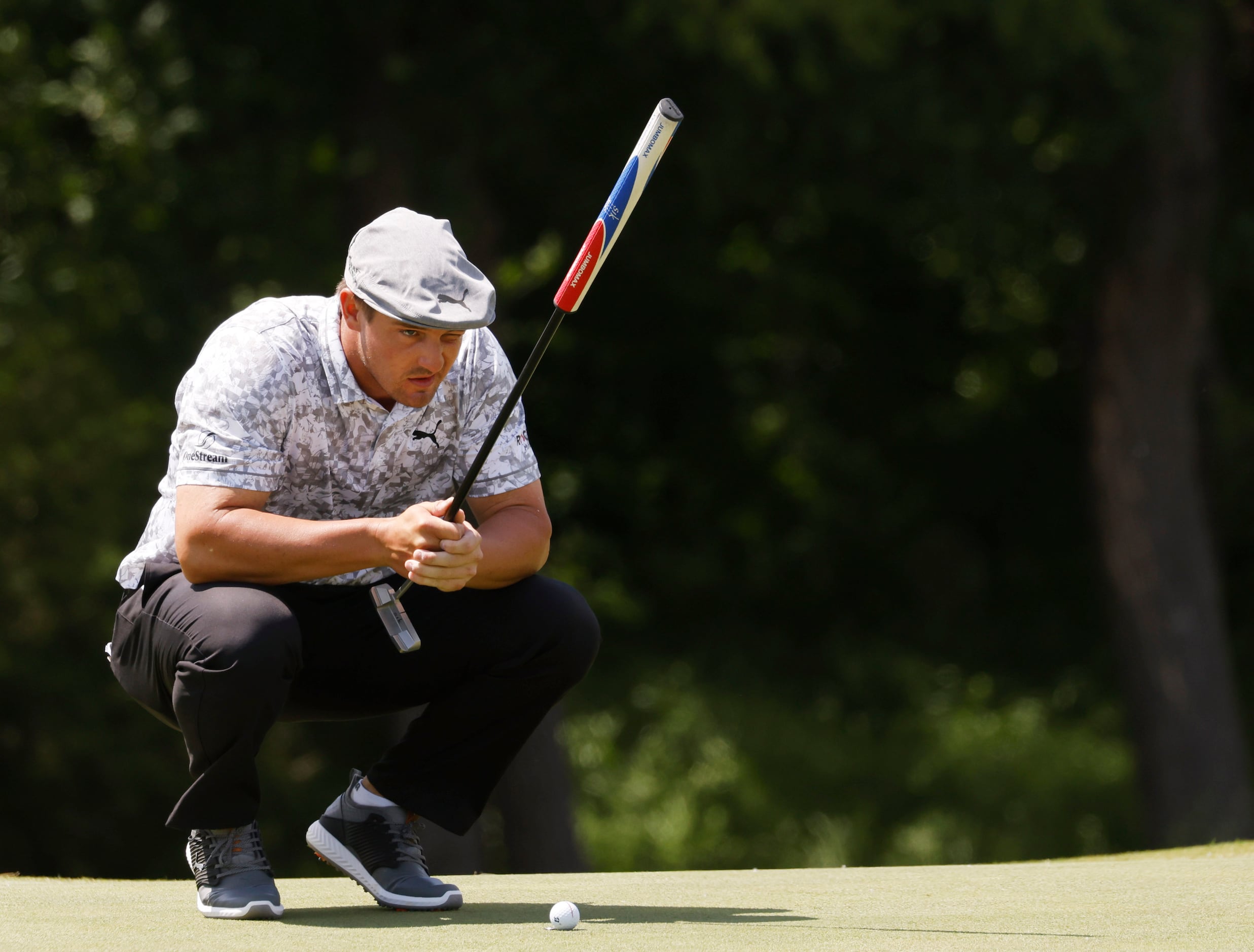 Bryson DeChambeau lines up his putt on the 9th hole during round 2 of the AT&T Byron Nelson ...