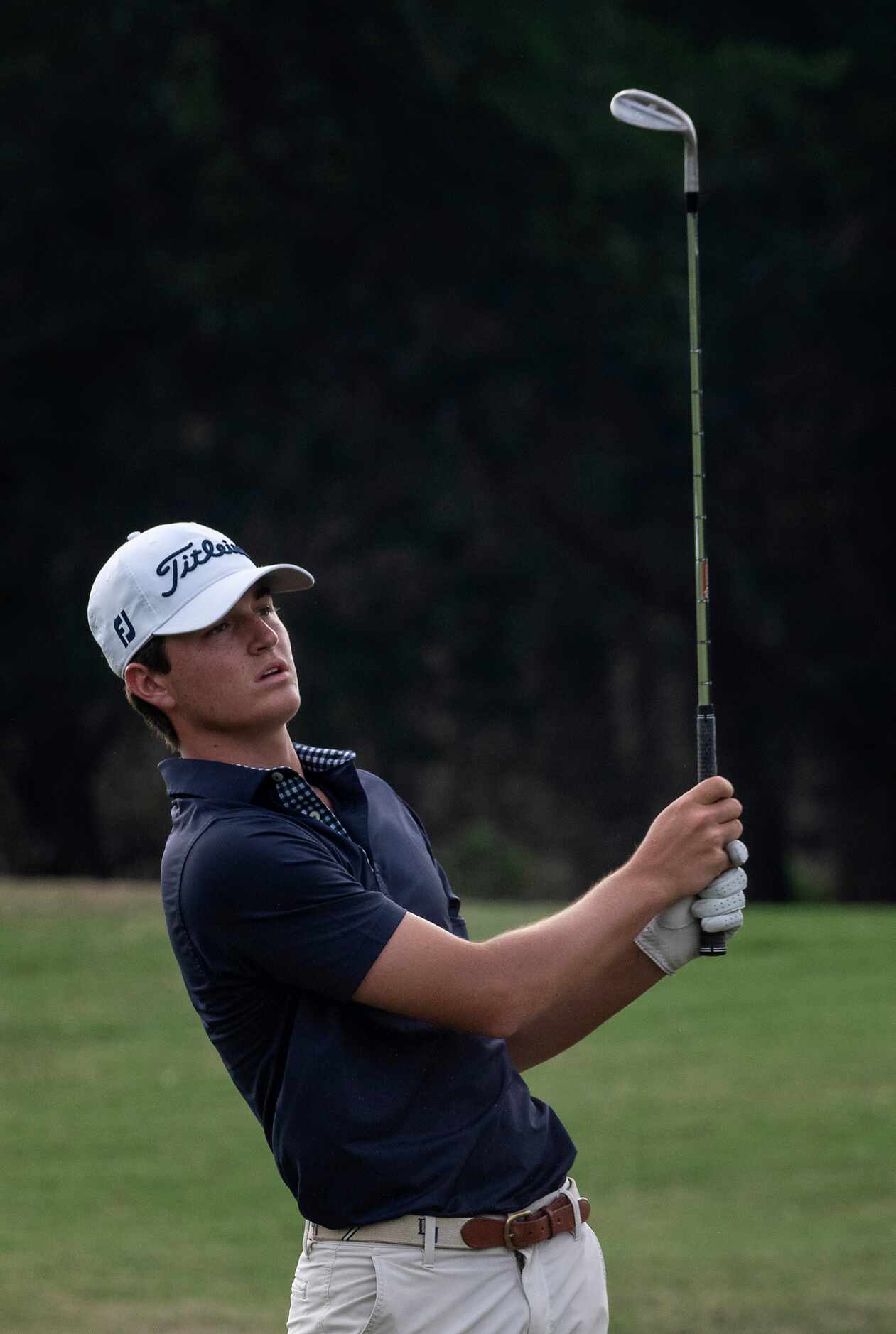 Richardson Pearce, Preston Stout, watches his fairway shot on the no.1 land on the green...