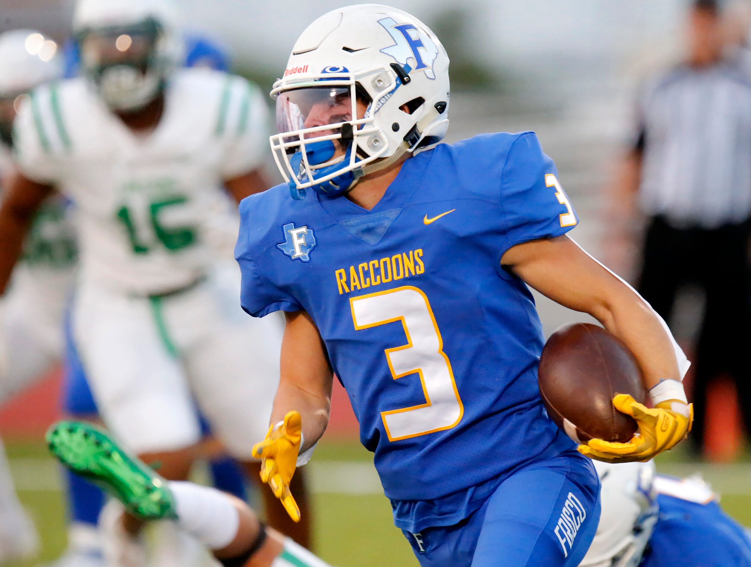 Frisco High School running back Dylan Hardin (3) runs for a touchdown during the first half...