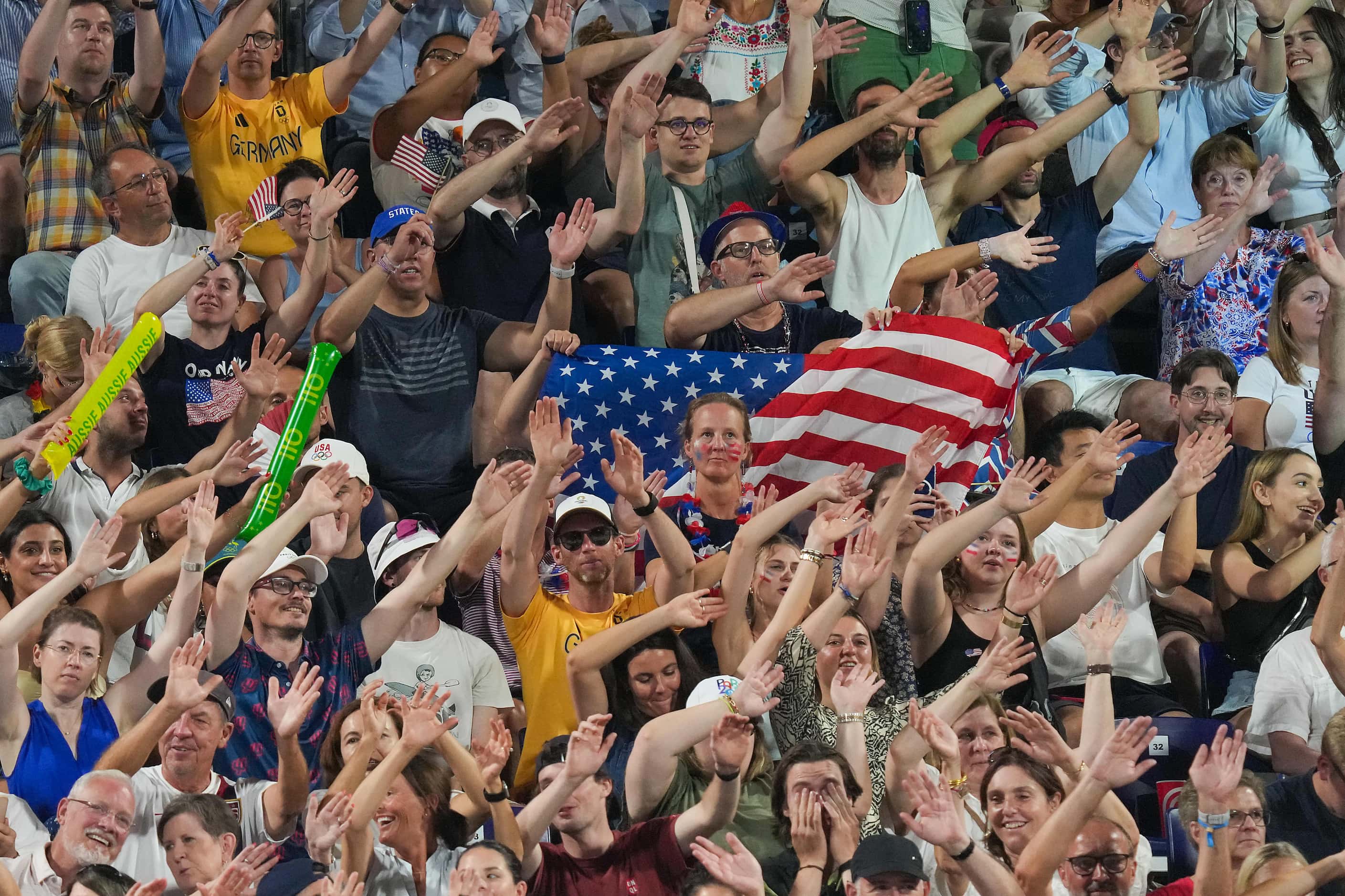 Fans cheer for Kristen Nuss and Taryn Kloth of the United States as they face Australia in...