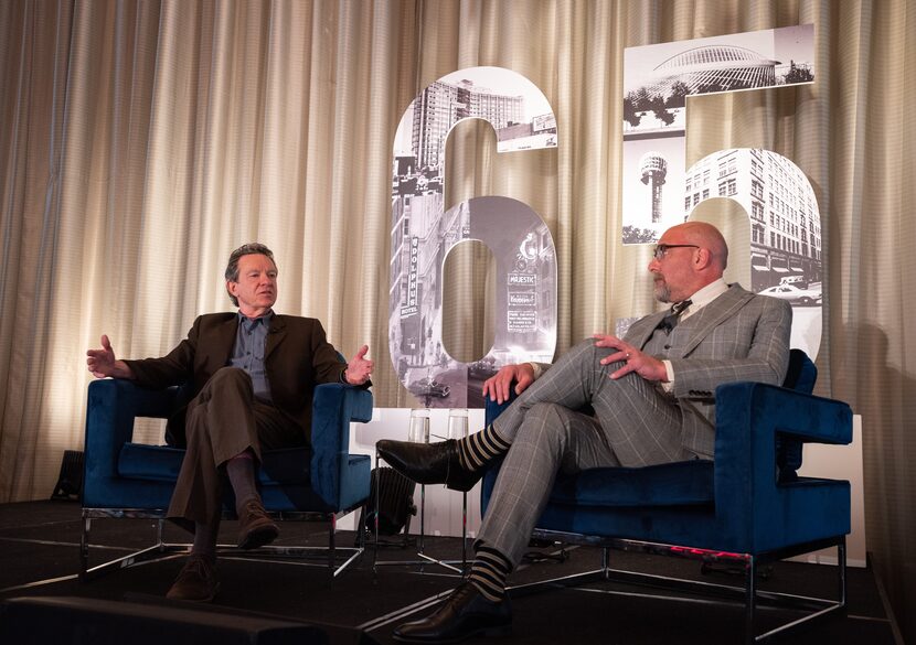 Pulitzer Prize-winning author Lawrence Wright, left, speaks with moderator Robert Wilonsky...