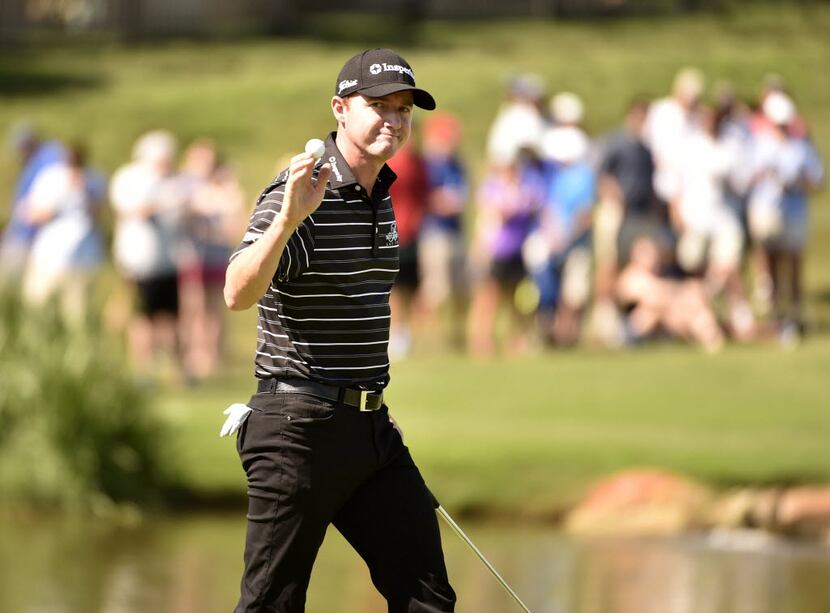 Jimmy Walker reacts after making a birdie on the 17th hole during the final round of the...