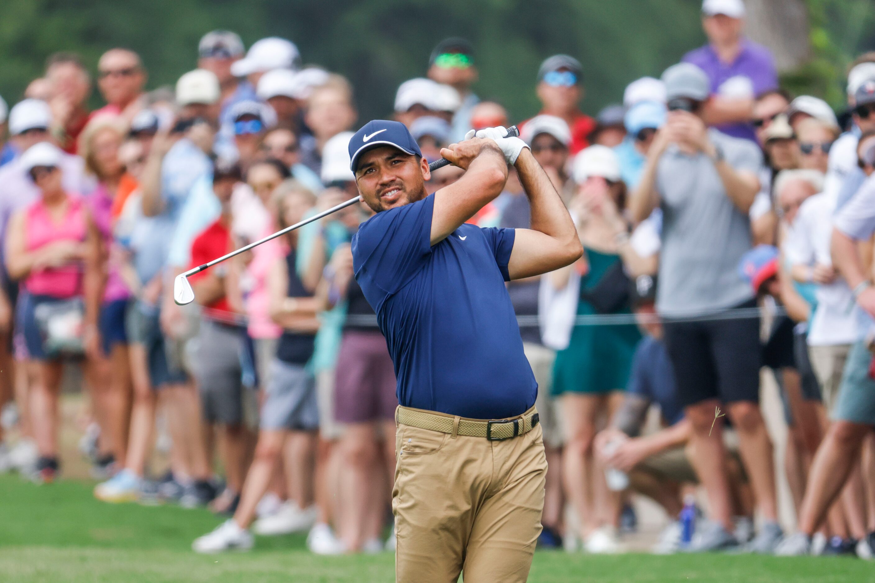 Jason Day watches as he hits on the green of the ninth hole during the second round of the...