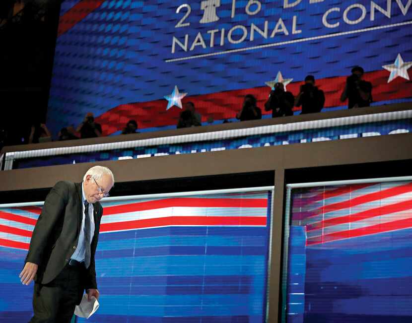 Bernie Sanders walks off the stage following his speech at the Democratic National...