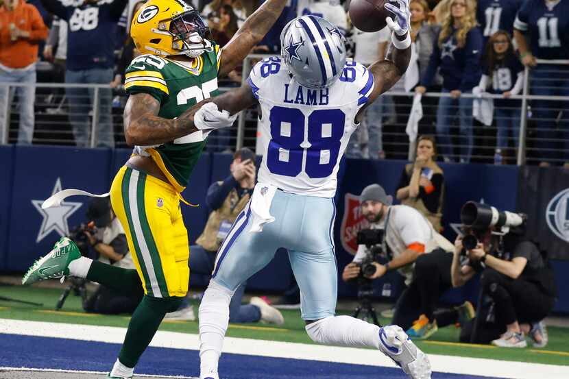 Dallas Cowboys wide receiver CeeDee Lamb (88) can’t corral a touchdown pass as he is...