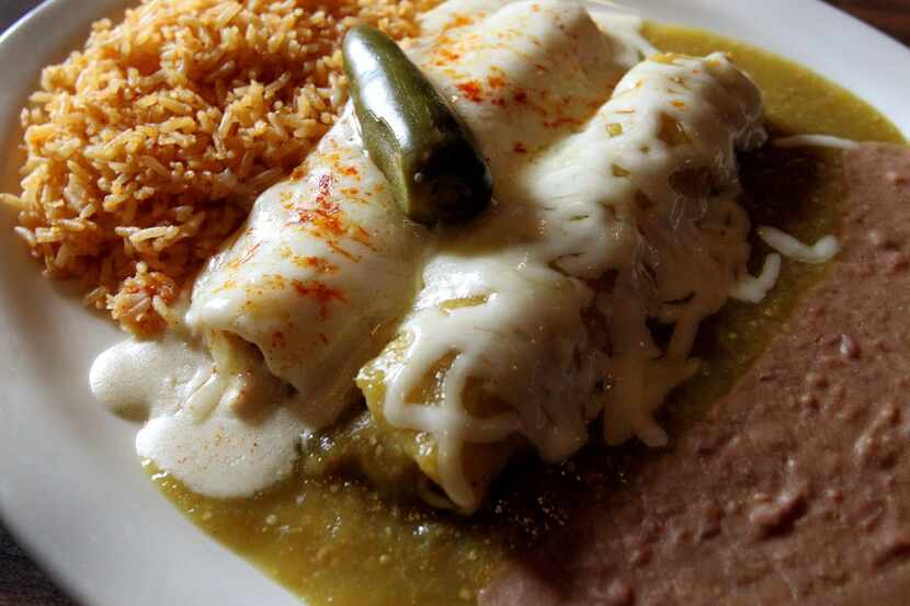 Ojeda's chicken enchilada plate  
