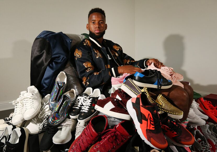 FC Dallas player Kellyn Acosta with his collection of shoes in his Prosper, Texas home...