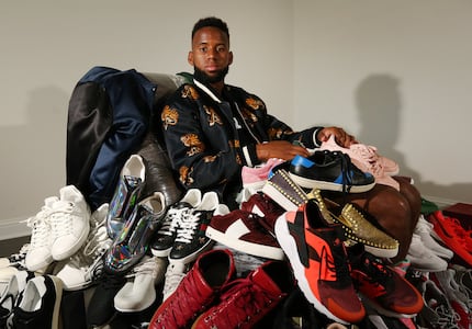 FC Dallas player Kellyn Acosta with his collection of shoes in his Prosper, Texas home...