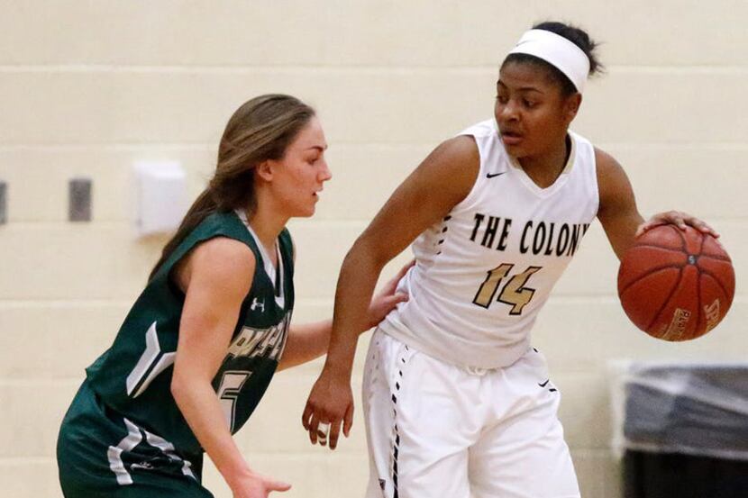 The Colony's Tamia Jones (right) dribbles as she is defended by Prosper's Mackenzie Hewitt...