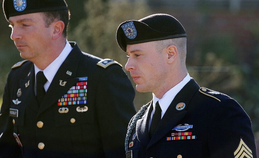  Army Sgt. Bowe Bergdahl, right, arrives for a pretrial hearing at Fort Bragg, N.C., with...