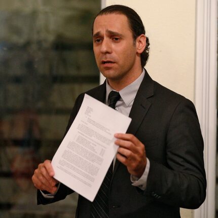 HMK landlord Khraish Khraish holds a copy of his development plan for his West Dallas...