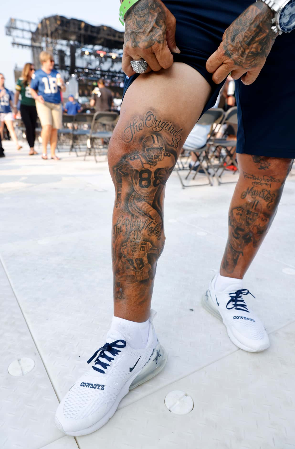 Mark Shenefild shows off his tattoo of Pro Football Hall of Fame inductee Drew Pearson of...