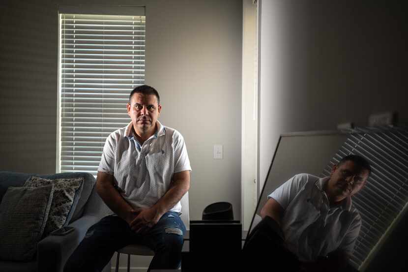 Nestor Cuevas, 40, originally of Venezuela, shown inside his family's home in Lewisville, on...