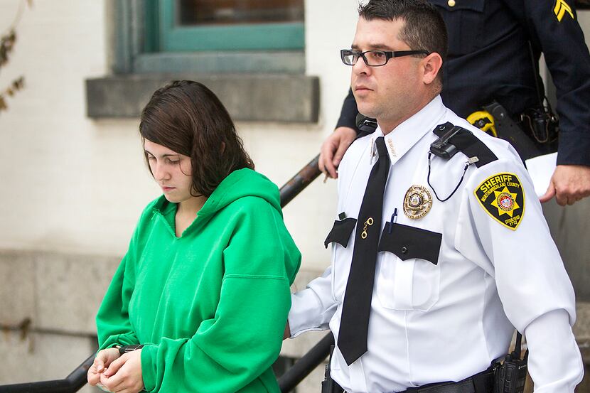 In this Dec. 20, 2013 file photo, Miranda Barbour is led out of the courthouse after her...