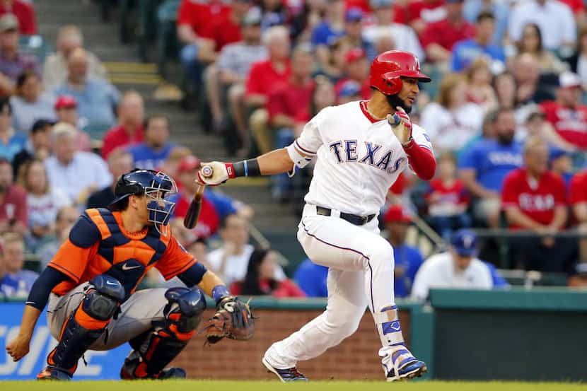 Texas Rangers right fielder Nomar Mazara (30) follows through on his swing as he got to...