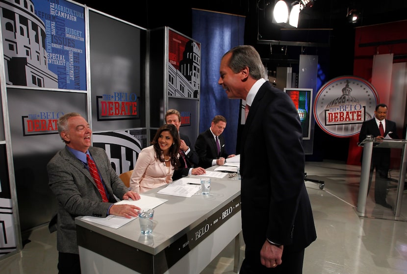 Republican candidate for U.S. Senate, Lt. Gov. David Dewhurst, center, jokes with Dallas...