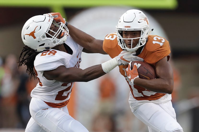 FILE - In this Saturday, April 21, 2018 file photo, Texas wide receiver Jerrod Heard (13) is...