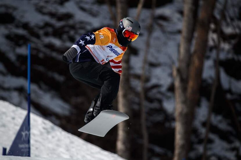 Texan Michael Spivey competes during the men's Snowboard Cross run at the Jeongseon Alpine...