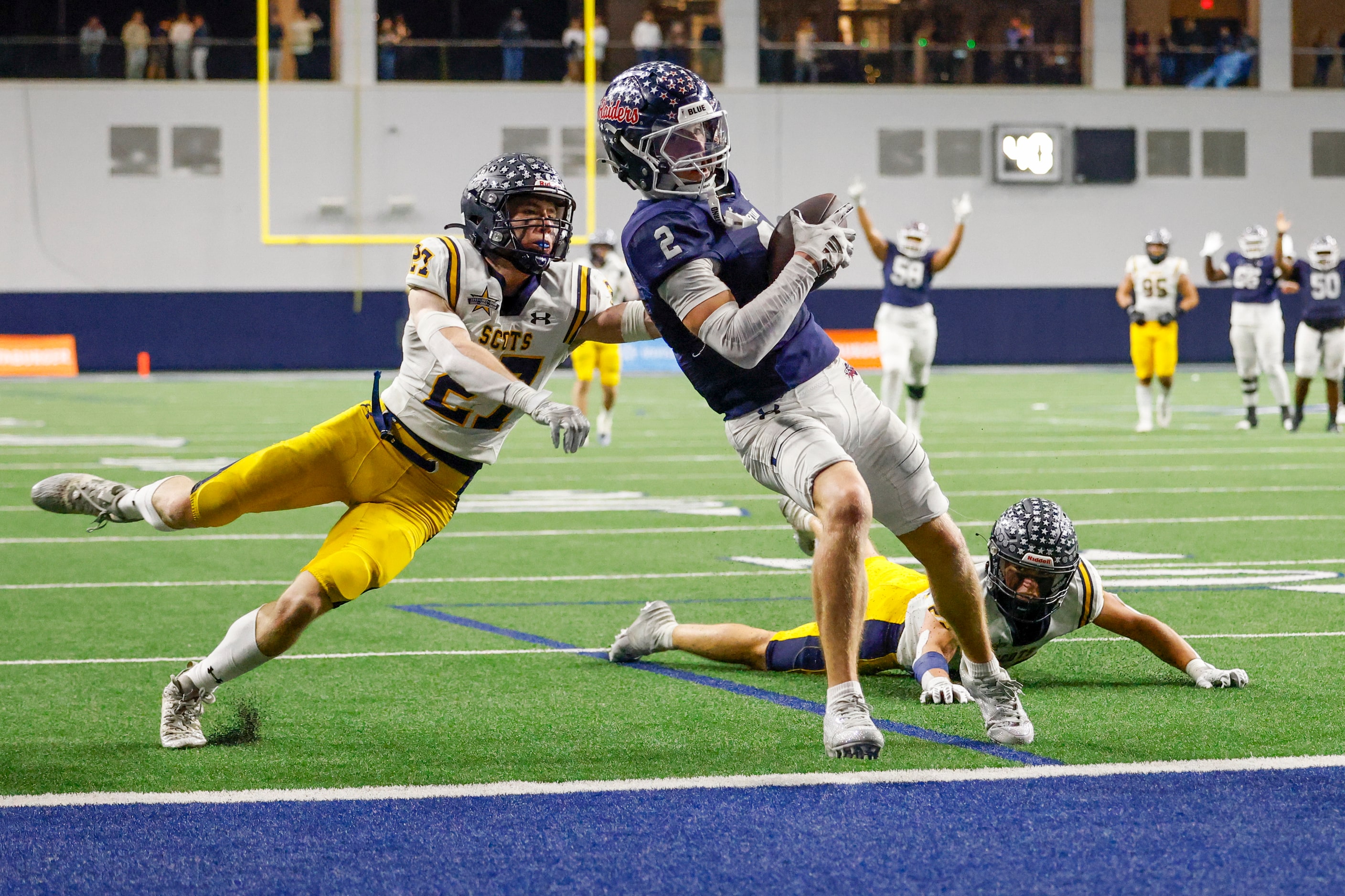 Denton Ryan wide receiver Braeden Mussett (2) catches a pass for a touchdown ahead of...