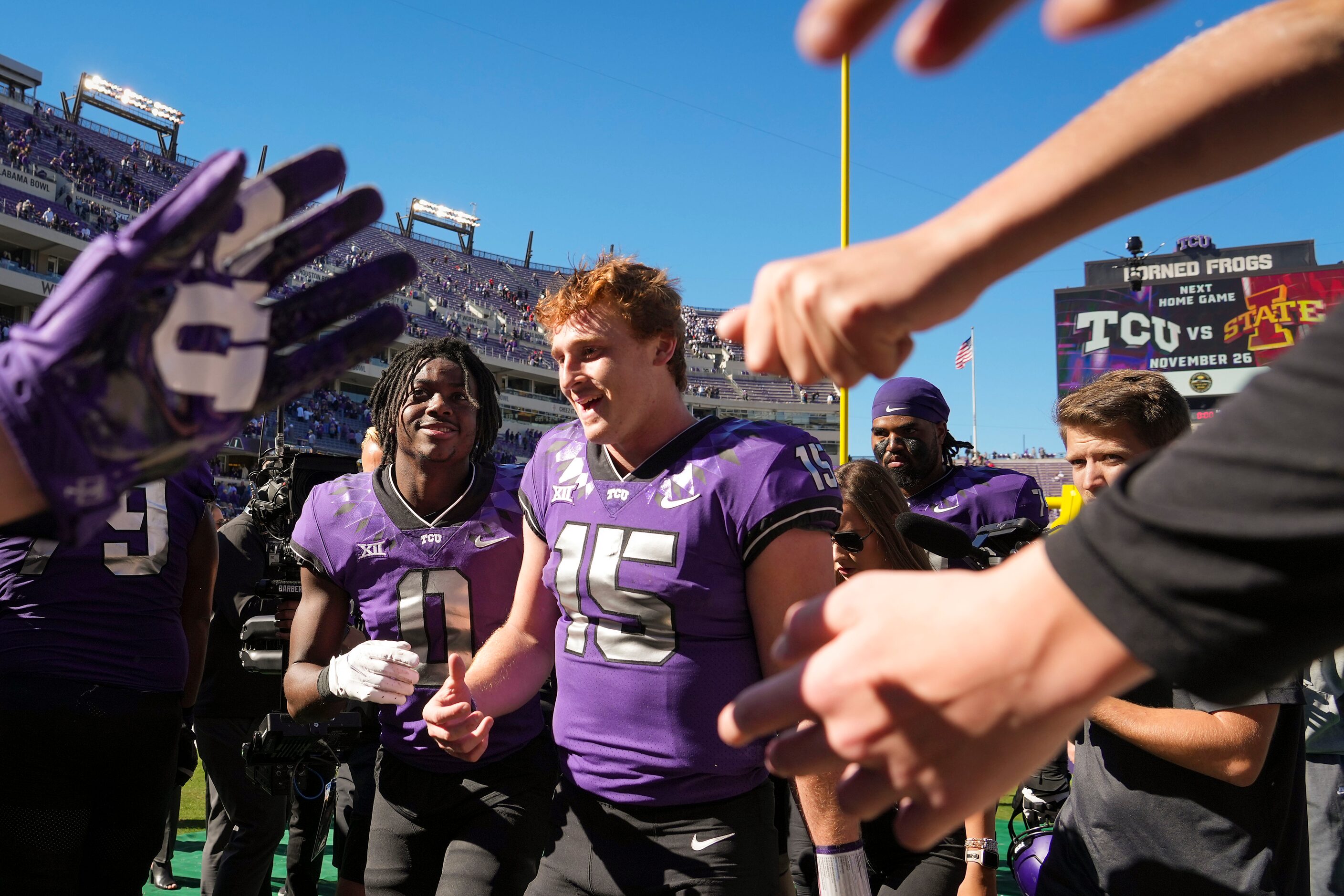 TCU quarterback Max Duggan (15) leaves the field after a victory over Texas Tech in an NCAA...