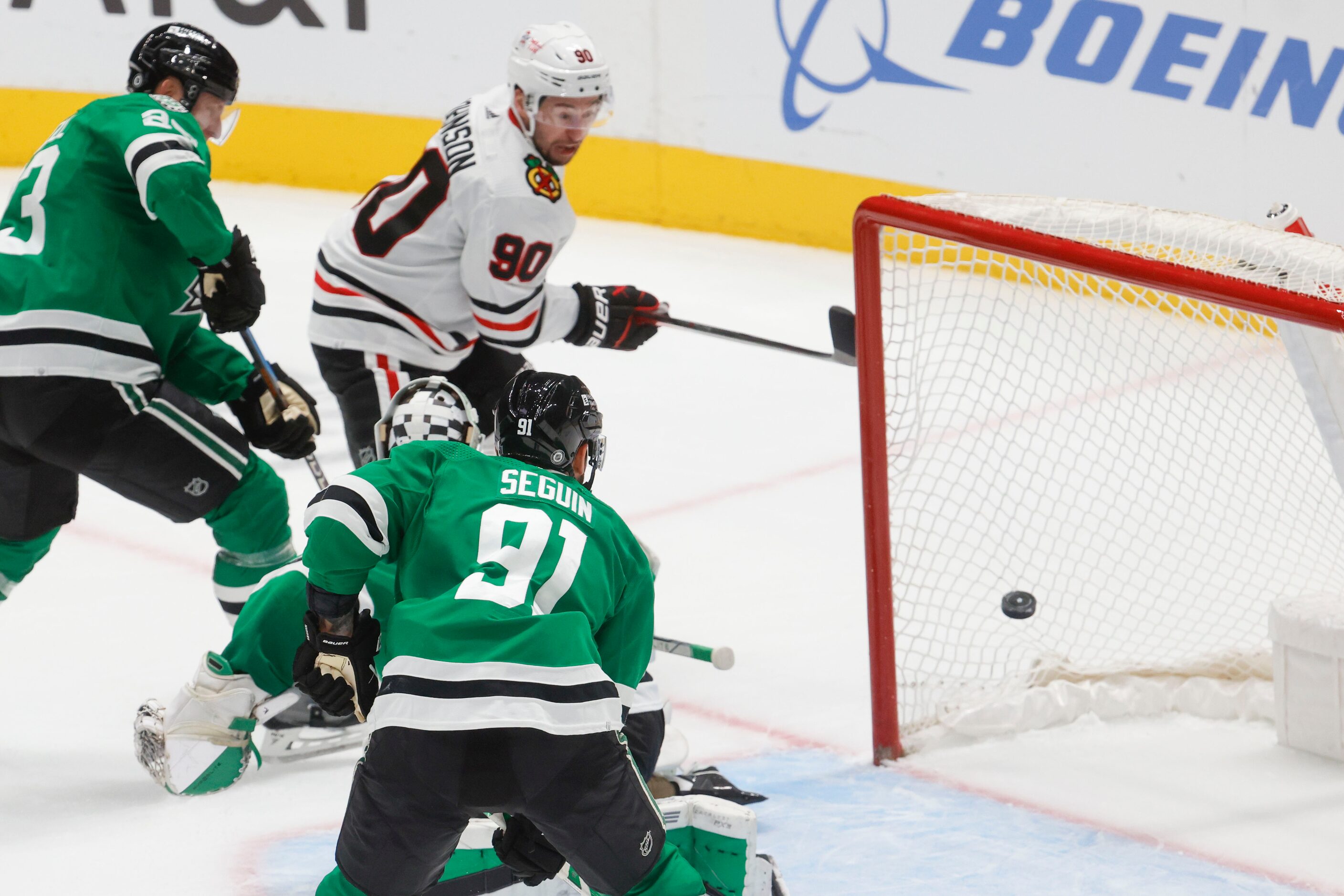 Chicago Blackhawks center Tyler Johnson (90) watches as the puck goes in for a goal against...