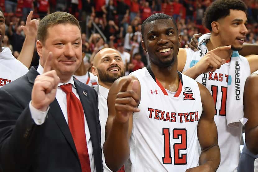 LUBBOCK, TX - MARCH 3: Head coach Chris Beard and Keenan Evans #12 of the Texas Tech Red...
