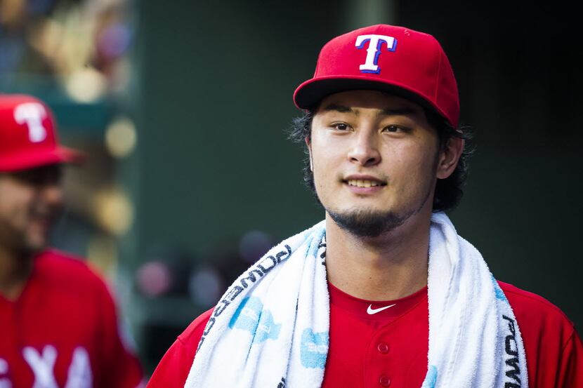 Texas Rangers starting pitcher Yu Darvish in the dugout after pitching during the fourth...