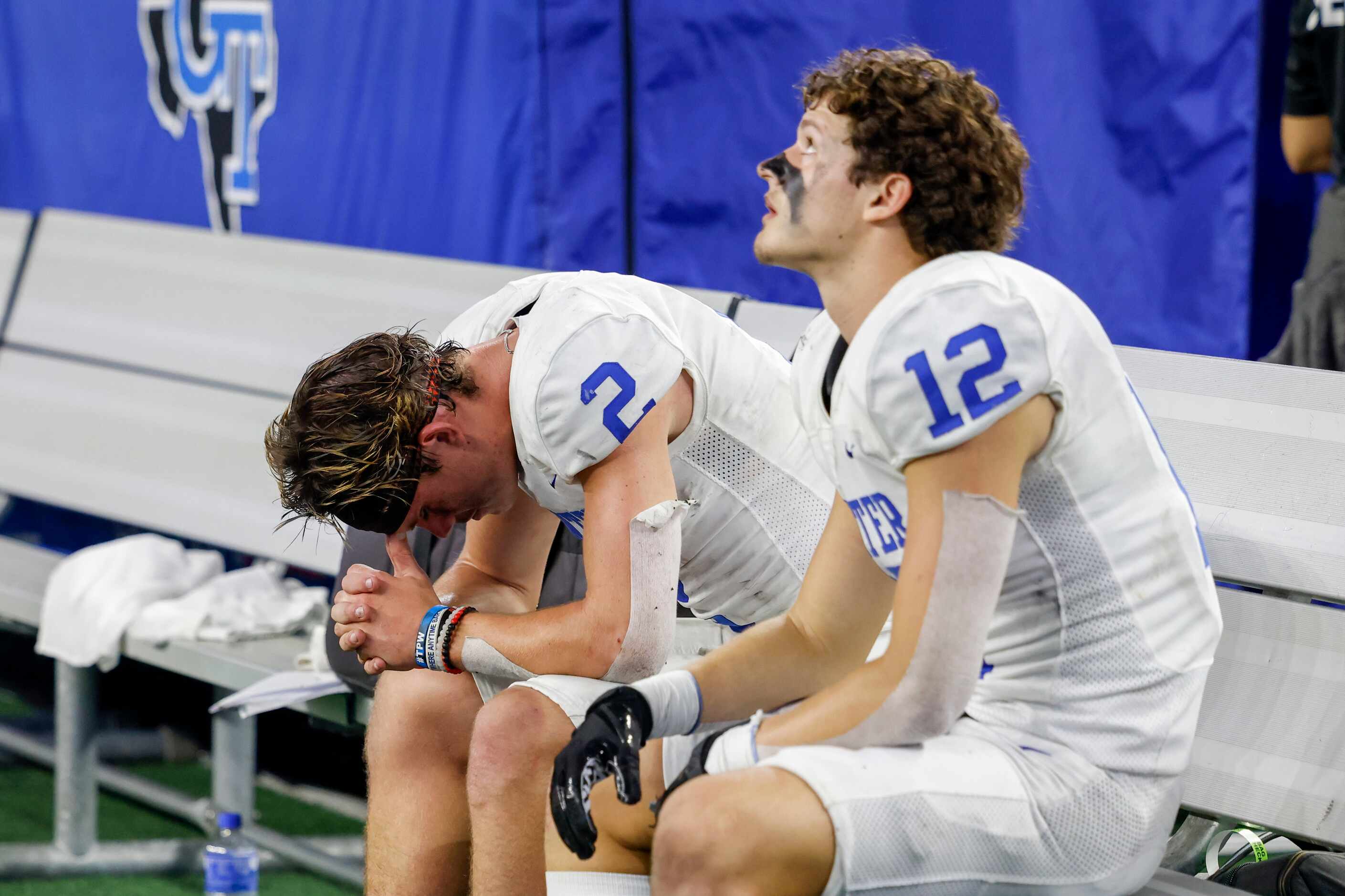 Gunter quarterback Hudson Graham (2) reacts after throwing an interception alongside Gunter...