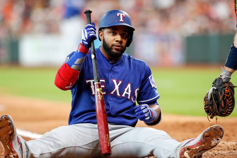 HOUSTON, TX - JULY 21:  Elvis Andrus #1 of the Texas Rangers reacts after a pitch thrown by...