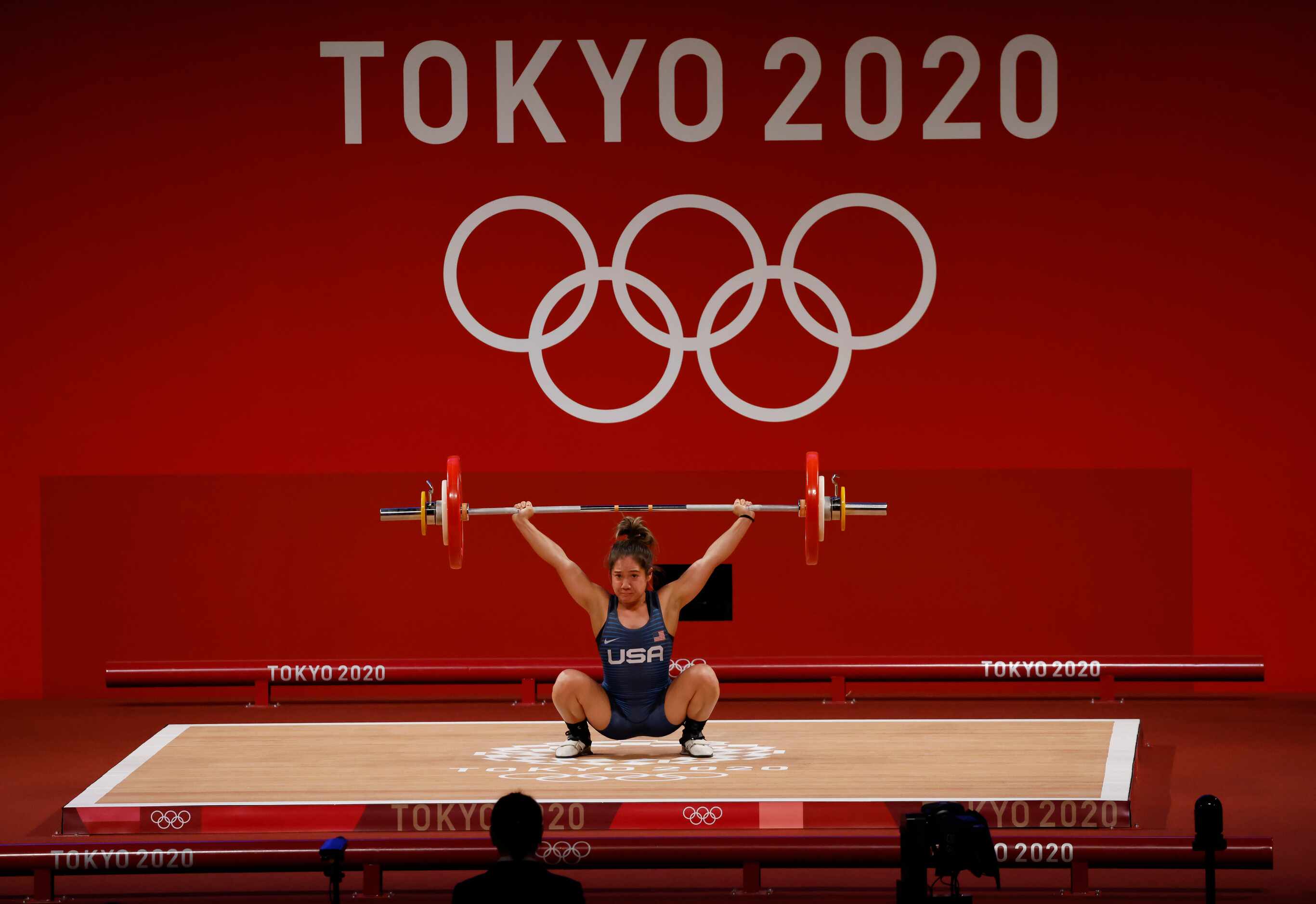 USA’s Jourdan Delacruz competes in the second attempt of the snatch round lifting 86 kg...