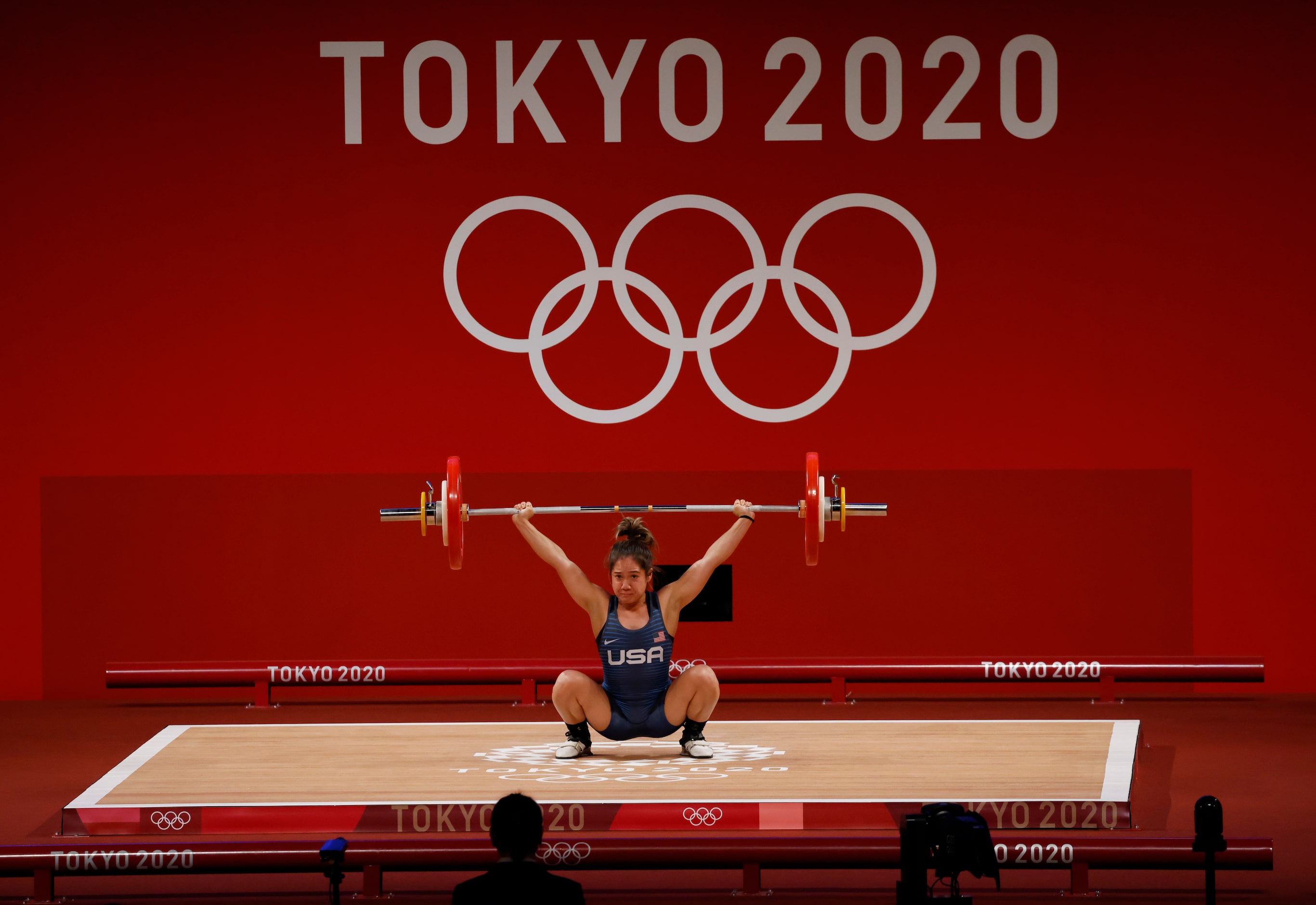 USA’s Jourdan Delacruz competes in the second attempt of the snatch round lifting 86 kg...