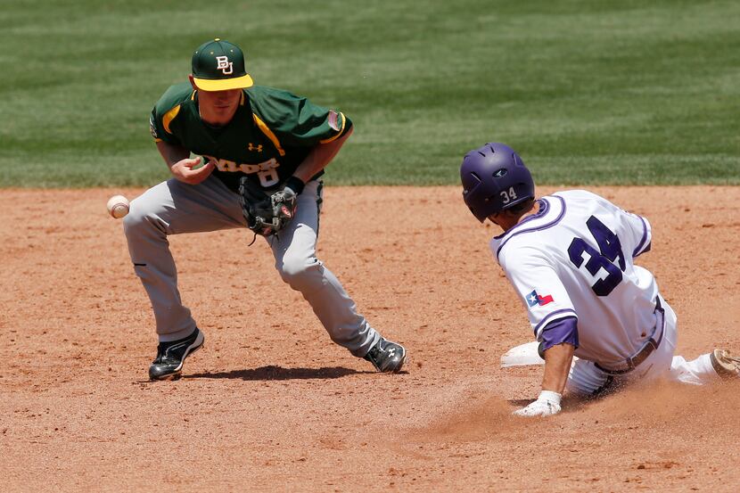 TCU's Garrett Crain (34) steals second as Baylor's Lawton Langford (8) receives the ball in...