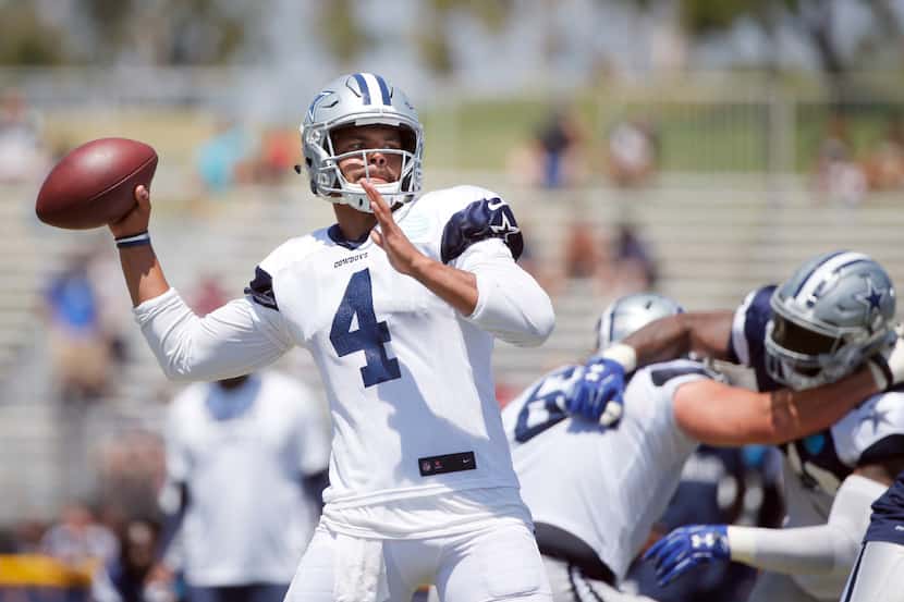 Dallas Cowboys quarterback Dak Prescott (4) attempts a pass on a play in practice during...