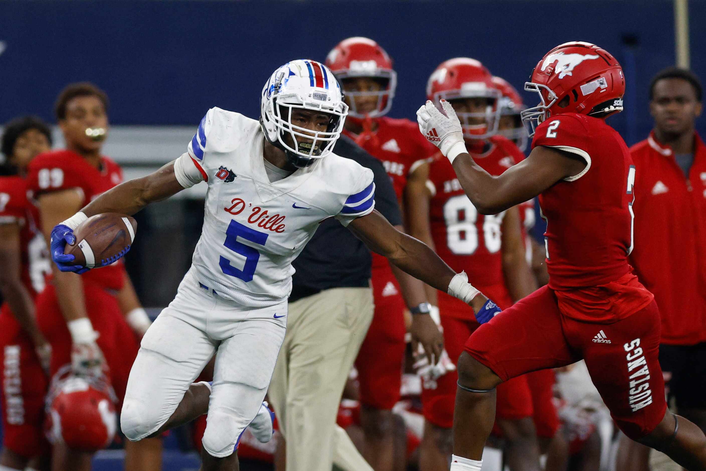 Duncanville running back Malachi Medlock (5) runs along the sideline with Galena Park North...